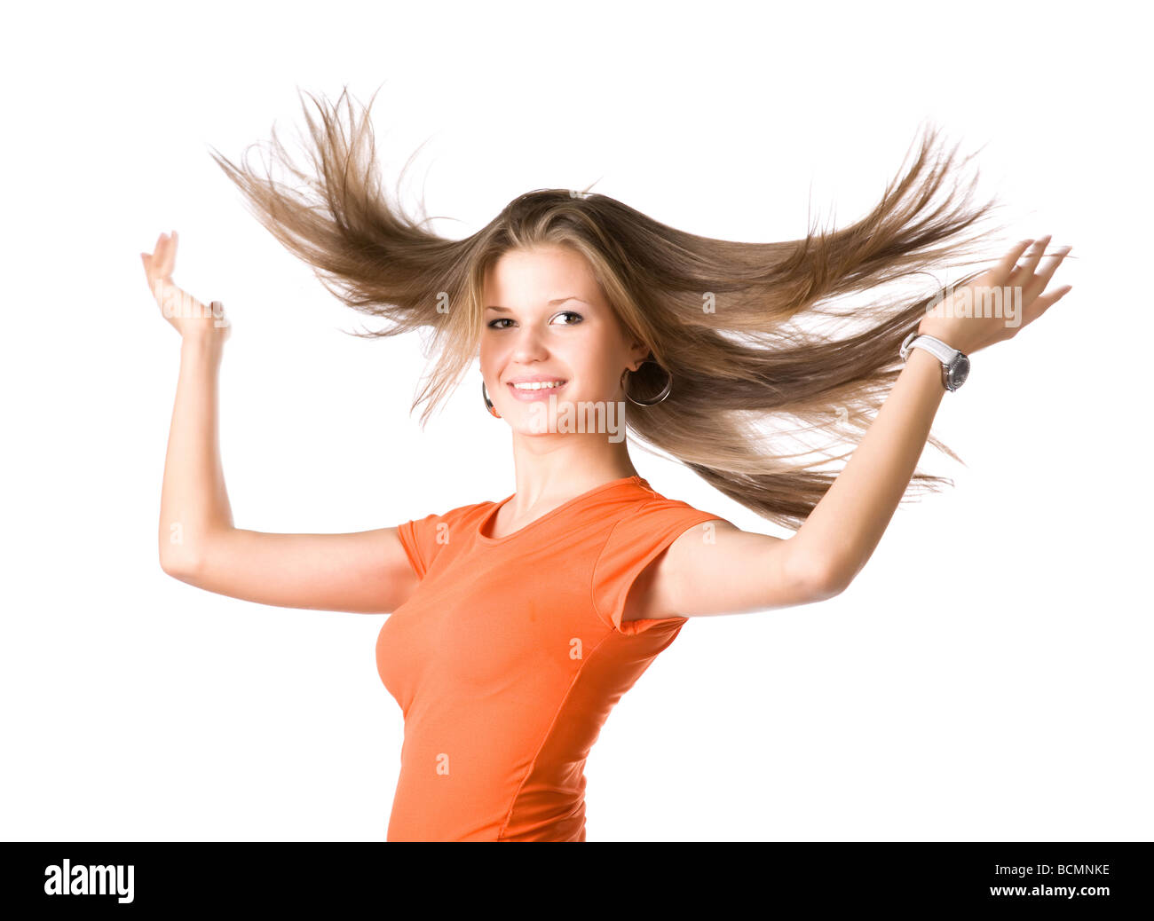 Junge Frau mit flatternden Haare isoliert auf weiß Stockfoto