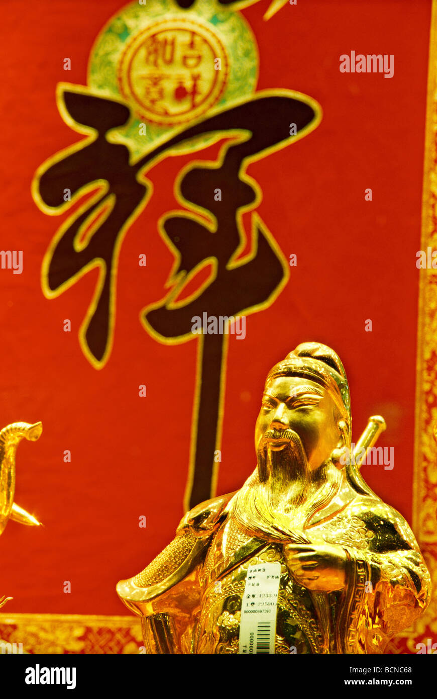 Gold plated Glück Gott in Laomiao Schmuck speichern, Shanghai, China Stockfoto