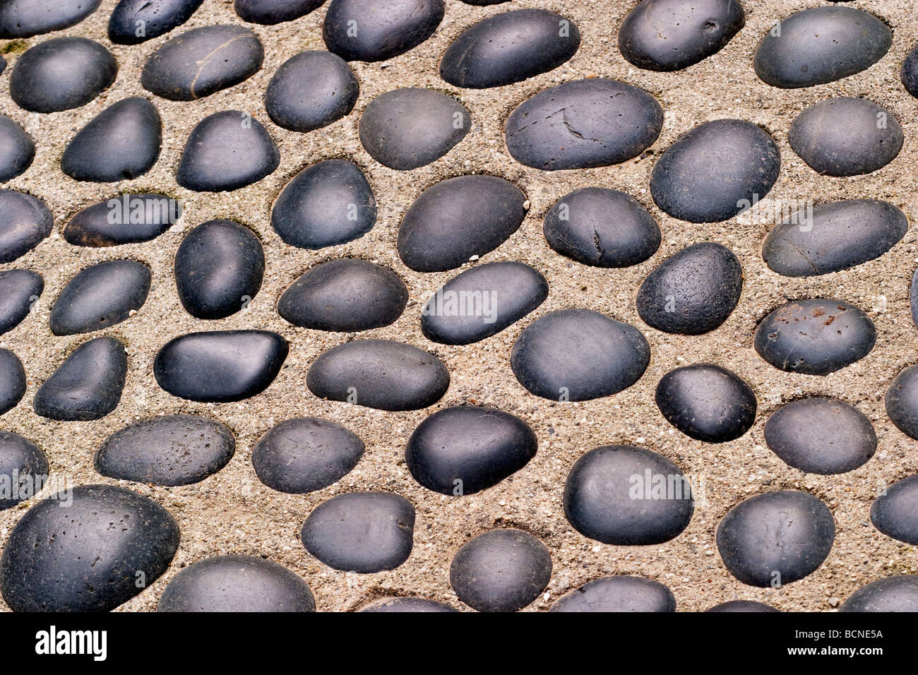 Terrasse mit eingelegten River Rock close-up Stockfoto