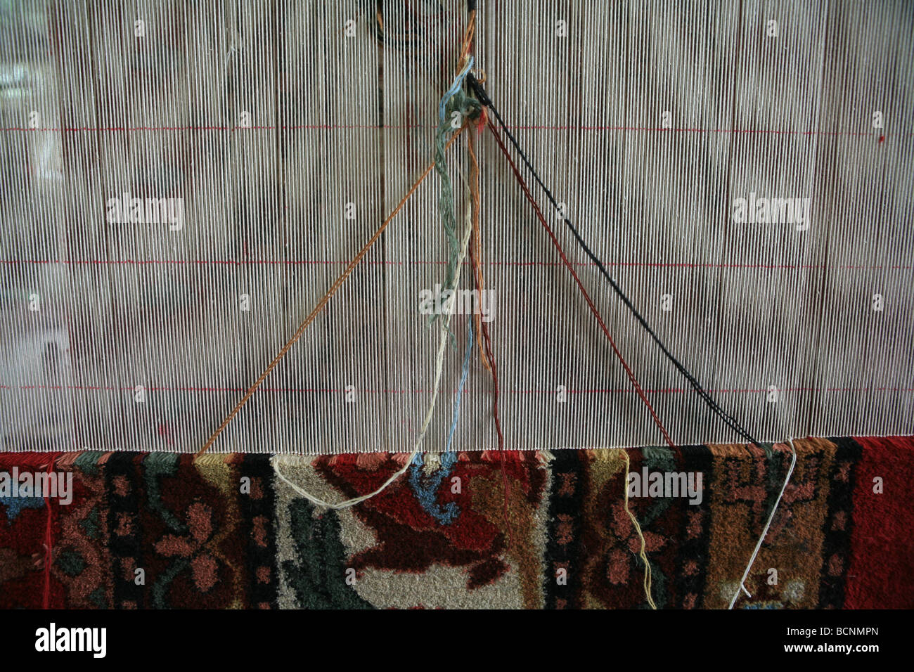 Detail der Hälfte fertig Teppich, Hotan, Xinjiang Uyghur autonome Region, China Stockfoto