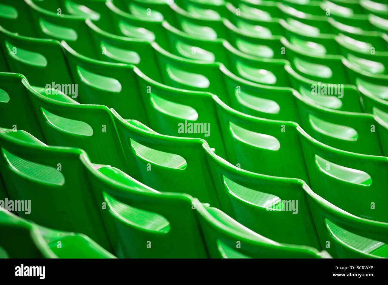 Hintergrund von Stadion grüne Stühle Rücken Stockfoto