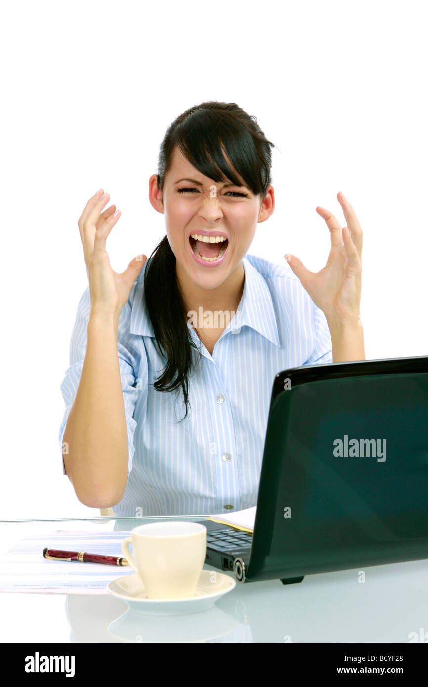 Junge Gestresste Geschaeftsfrau Mit Laptop Im Buero frustriert junge Geschäftsfrau im Büro Stockfoto