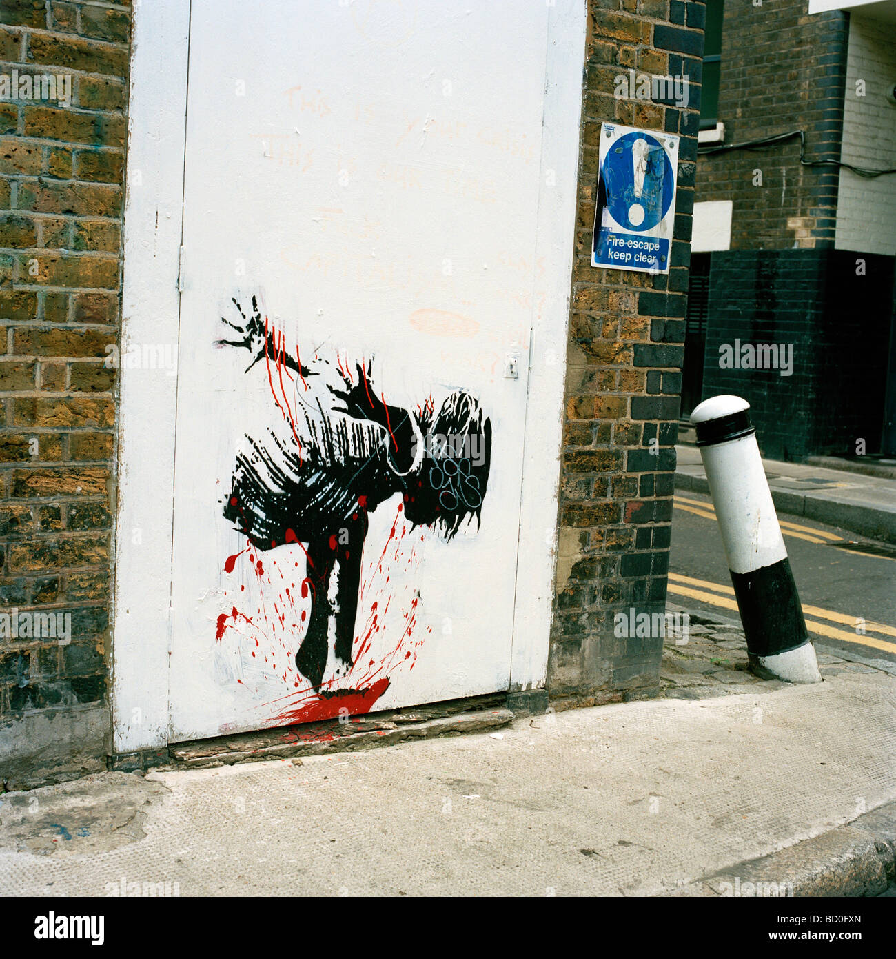 Schablone Graffiti an einer Straßenecke in Spitalfields, London Stockfoto