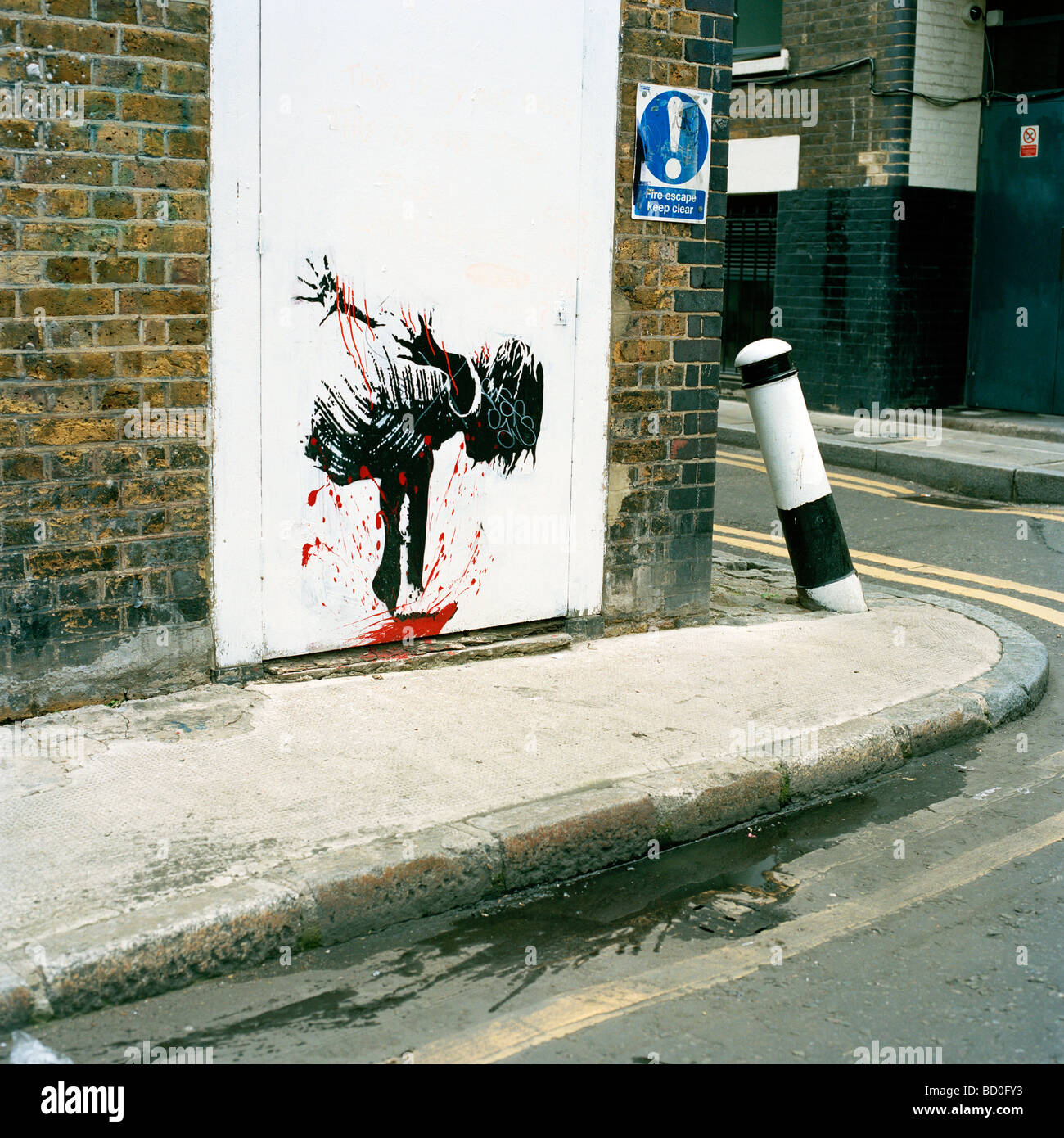 Schablone Graffiti an einer Straßenecke in Spitalfields, London Stockfoto