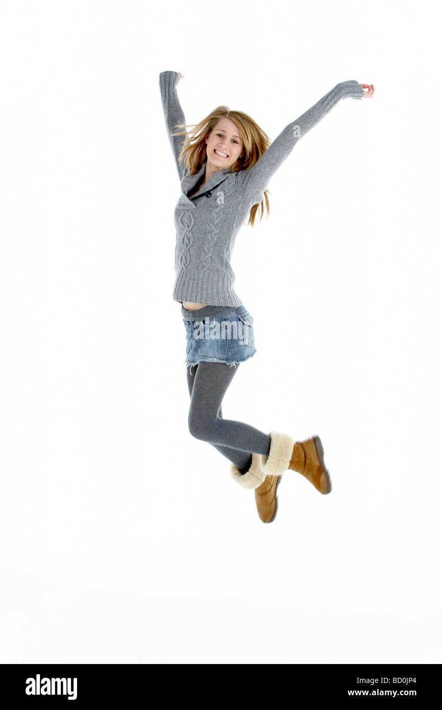 Full Length Portrait Of springen Teenager-Mädchen Stockfoto