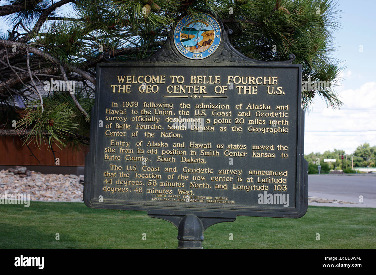 Ein Zeichen in Belle Fourche, South Dakota, kennzeichnet es als das geographische Zentrum der Vereinigten Staaten. Stockfoto