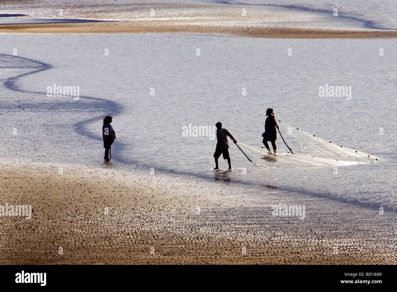 Aborigines Fischer Meer Schiffsankern Fischernetze Stockfoto