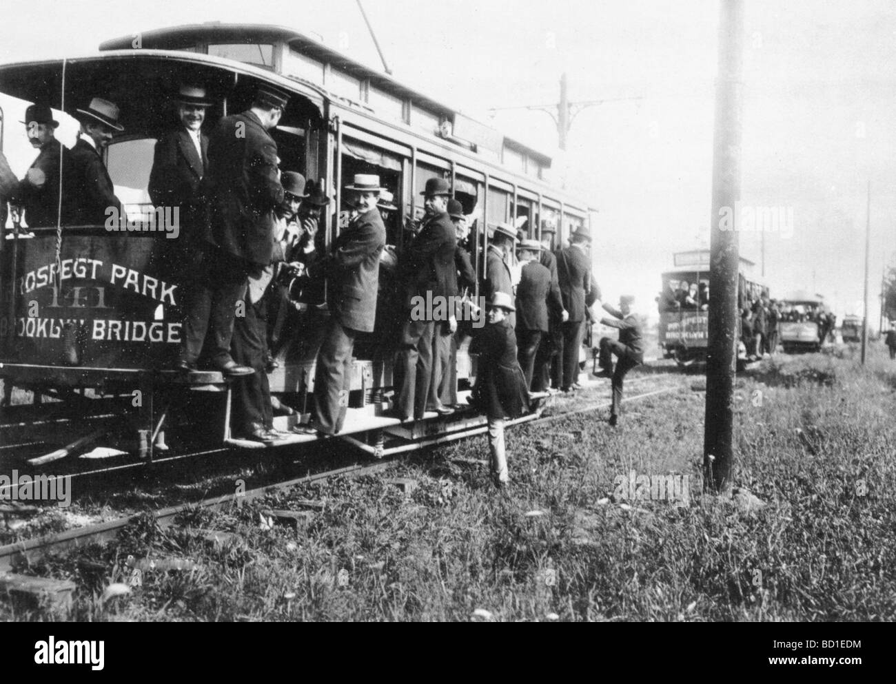 NEW YORK 1898 - Weg zur Arbeit auf einer Straßenbahn Stockfoto