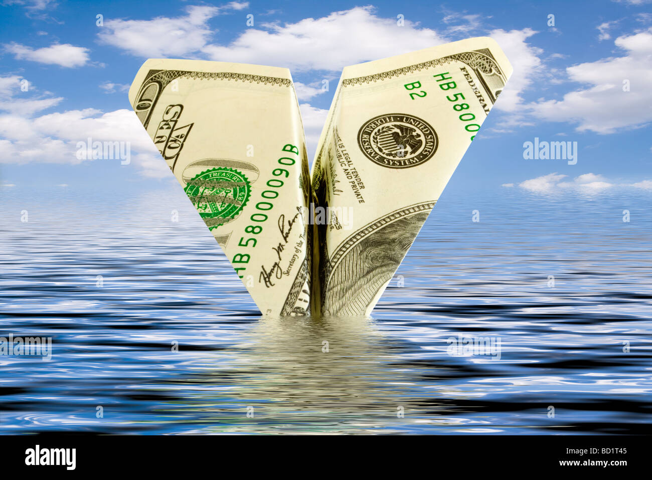 Insolvenz-Geschäft Geld Flugzeugabsturz in Wasser Stockfoto