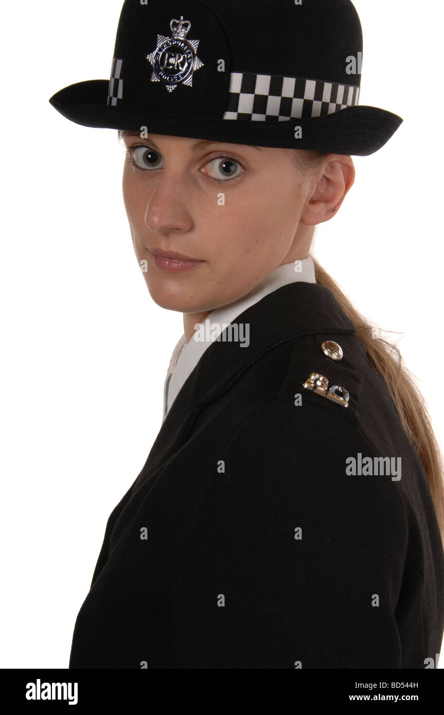 Uniformierte UK Polizistin isoliert auf weiss Stockfoto