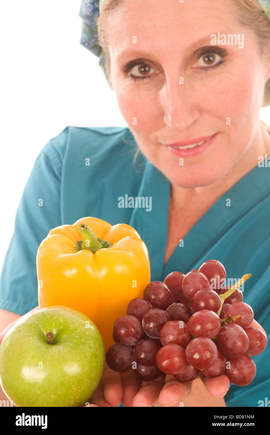 Arzt Krankenschwester Dame weiblichen Essen Gemüse Paprika Paprika