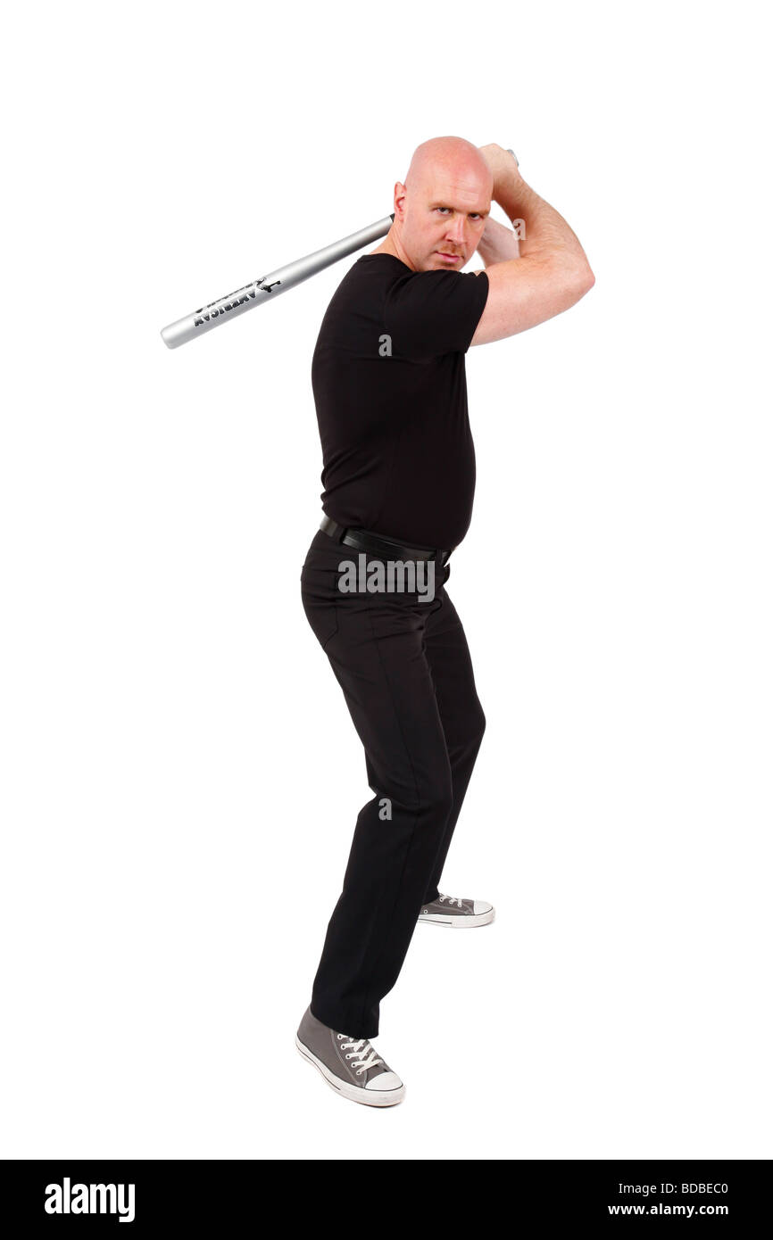 Leitung Glatzkopf mit Baseballschläger in seinen Händen schaut wütend in die Kamera Stockfoto
