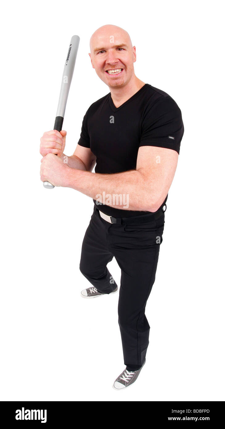 Leitung Glatzkopf mit einem Baseballschläger in den Händen, in die Kamera lachen Stockfoto