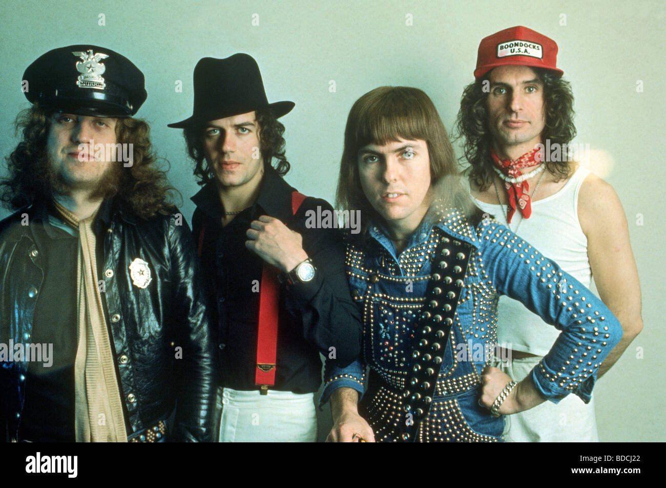 SLADE - UK-Glam-Rock-Gruppe über 1974. Aus l: Noddy-Halter, Jimmy Lea, Dave Hill, Don Powell Stockfoto