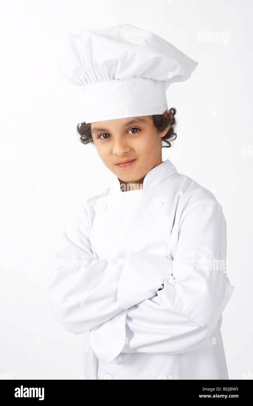 Junge verkleidet als Koch Stockfoto