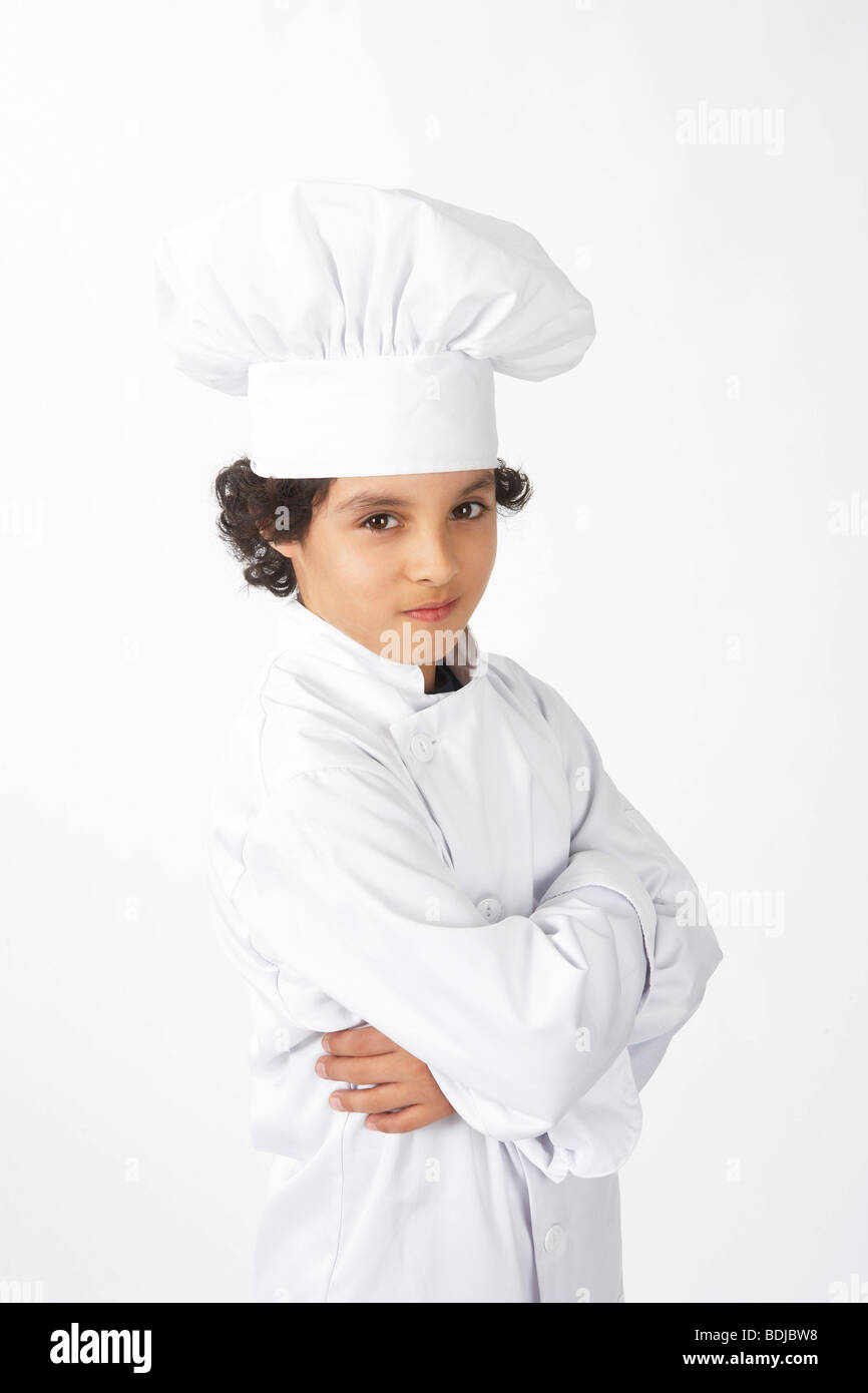 Junge verkleidet als Koch Stockfoto