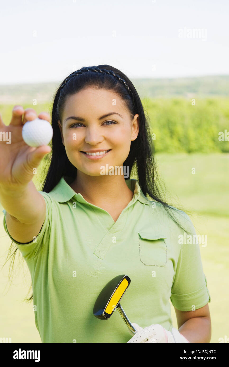 Frau am Golfplatz Stockfoto