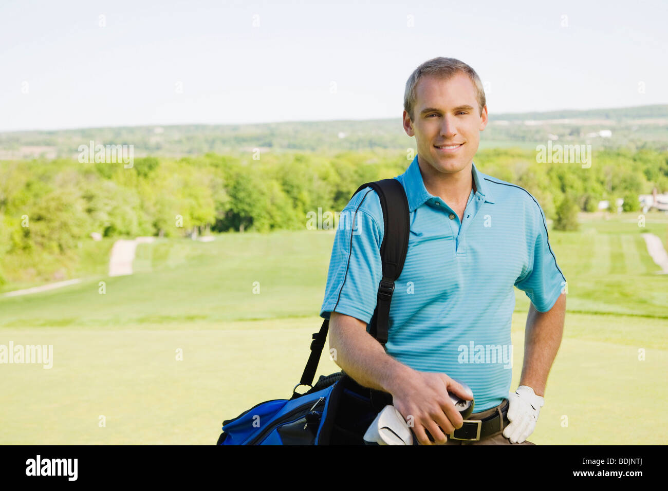 Mann am Golfplatz Stockfoto