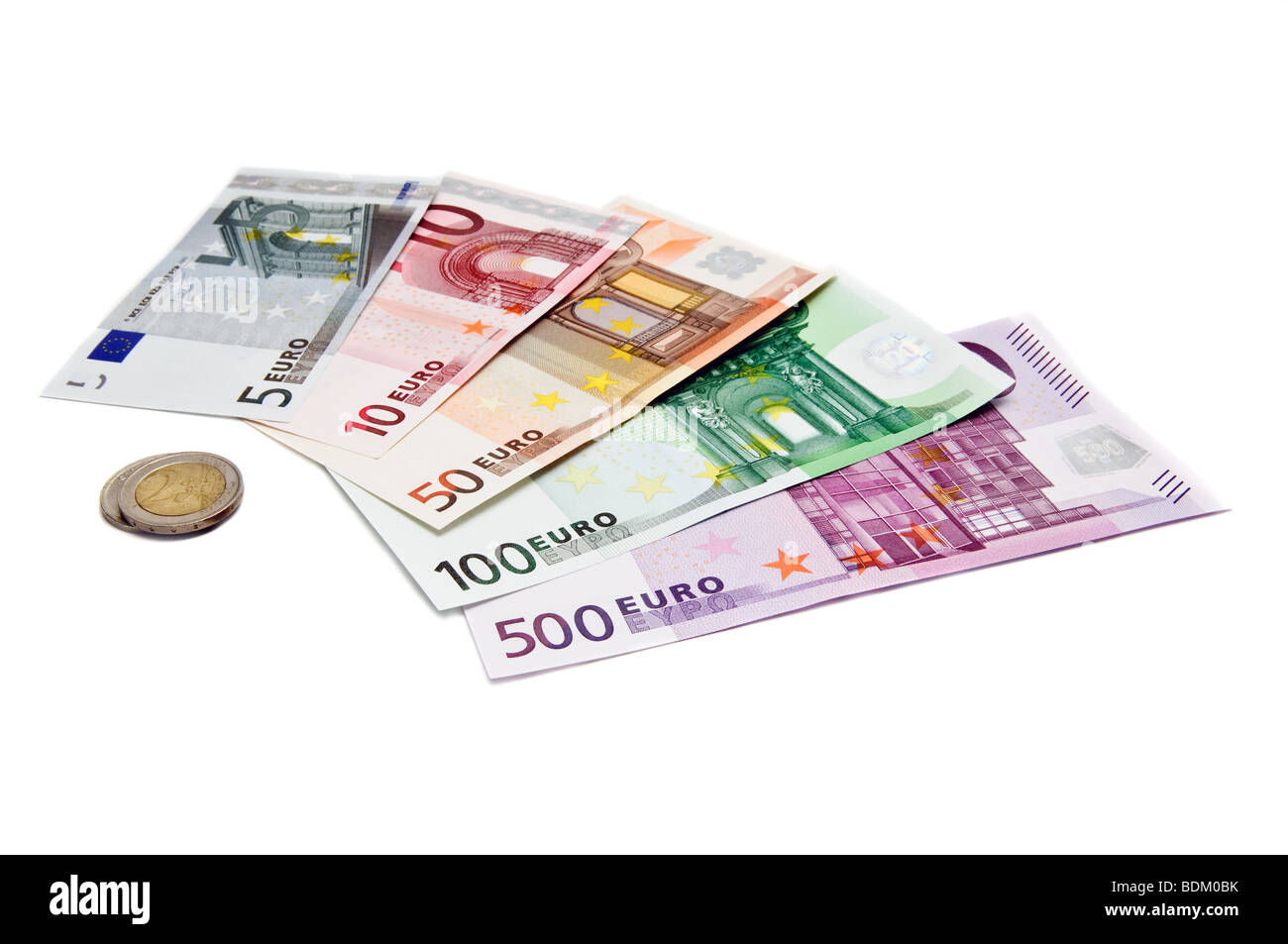 Euro-Währung und Münzen isoliert auf einem weißen Stockfoto