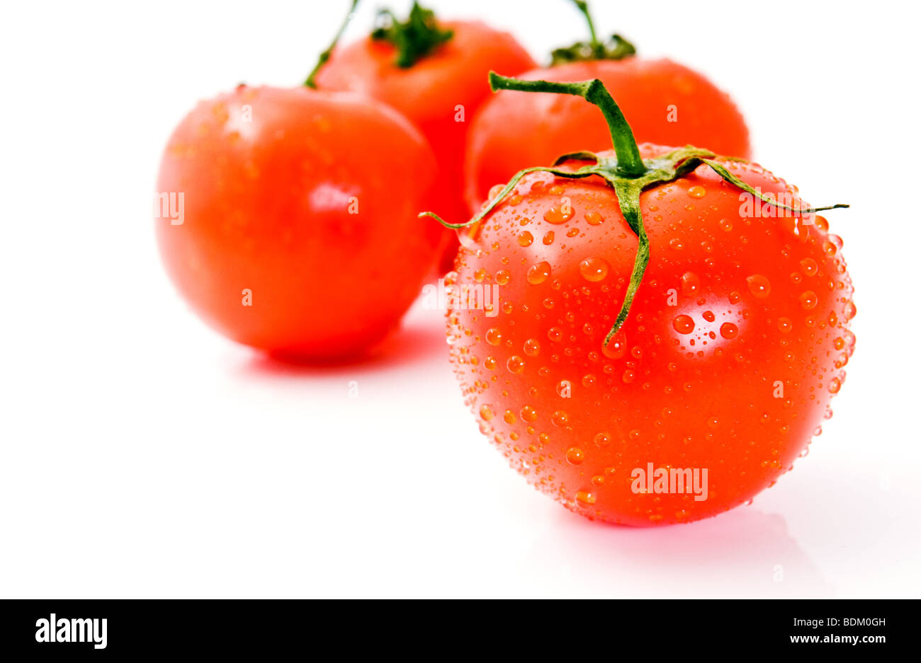 Tomate, isoliert auf weiss Stockfoto