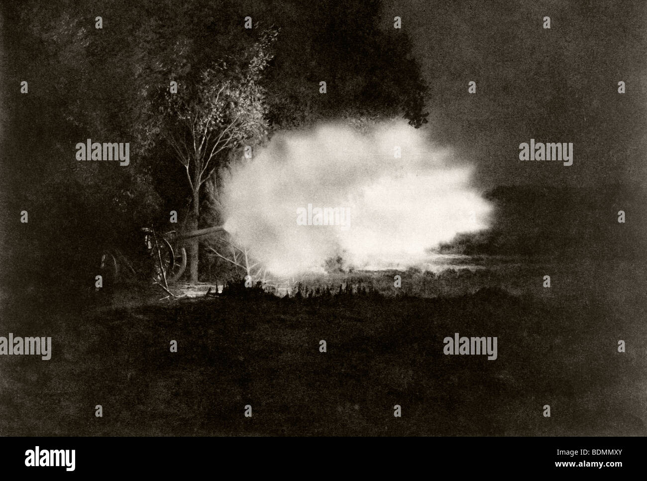 Eine 75mm Feldgeschütz in der Nacht brennen. Stockfoto