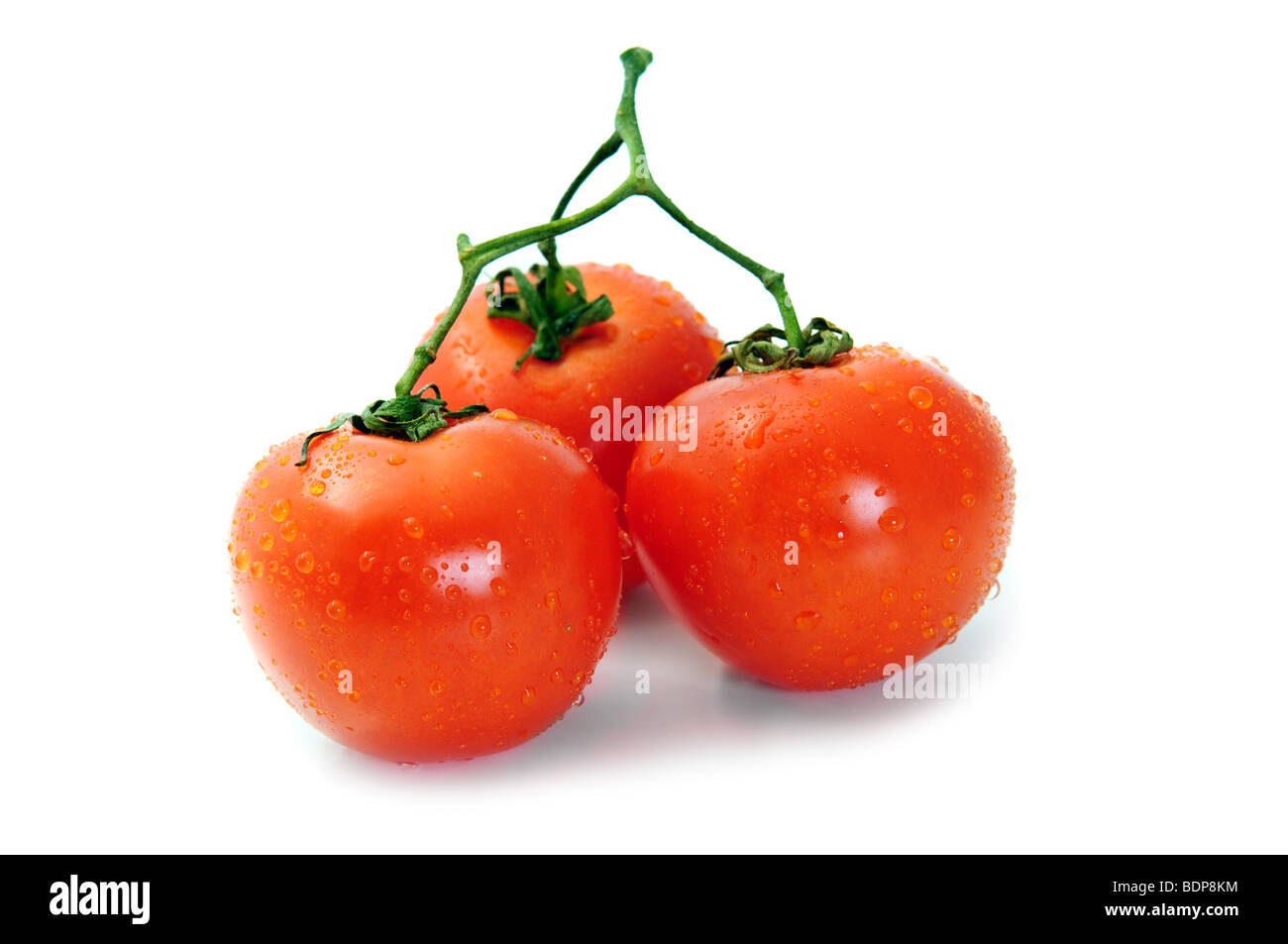 Gruppe-Cherry-Tomaten isoliert auf weiß Stockfoto