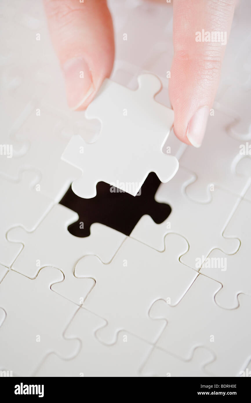 Ein Puzzle mit einem fehlenden Stück. Stockfoto