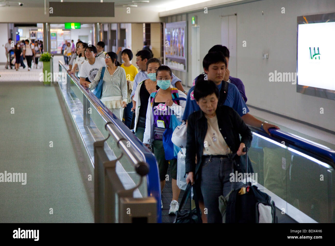 Besorgt über die Schweinegrippe in NRT Flughafen Tokio-Narita in Japan Stockfoto