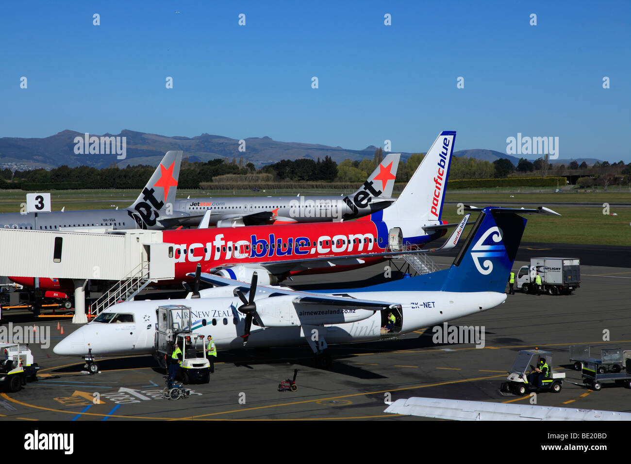 Jet Star, Pacific Blue Air New Zealand Link Fluggesellschaften an CHC Flughafen Christchurch, Canterbury, Südinsel, Neuseeland Stockfoto