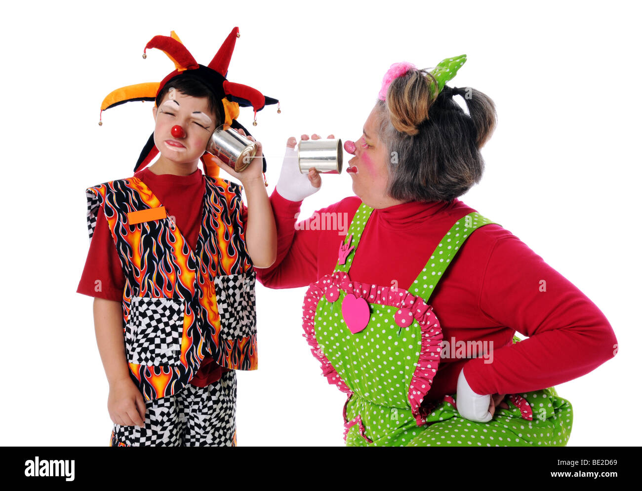 Clowns mit Blechdose Handys über einen weißen Hintergrund isoliert Stockfoto