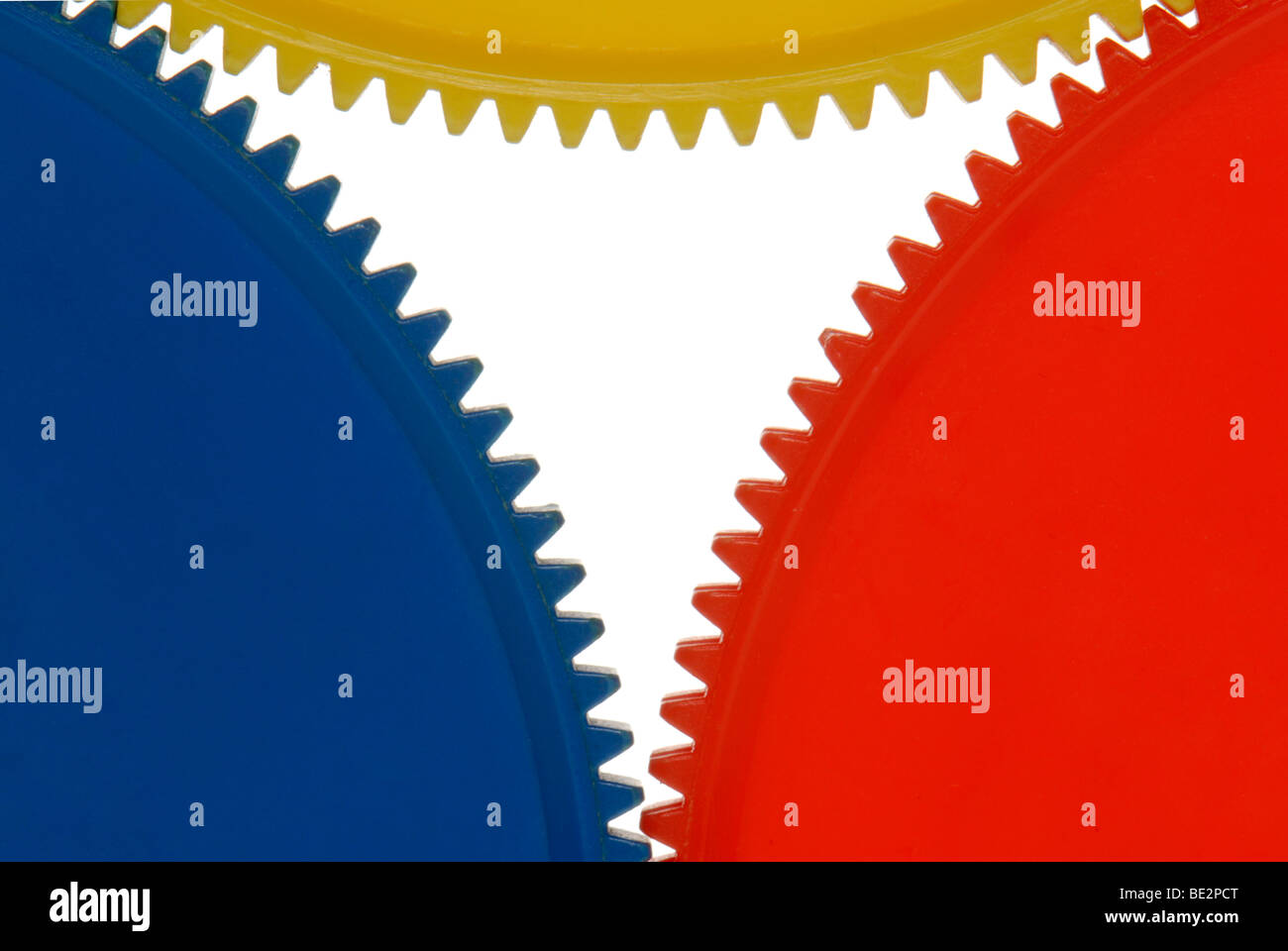 Drei ineinander greifende Zahnräder, Symbol für Teamplay Stockfoto