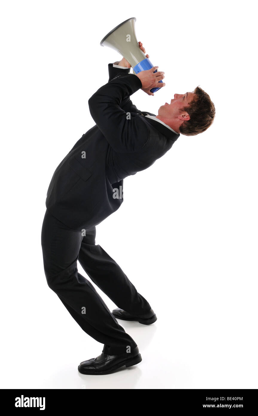 Geschäftsmann schreiend auf einem Megaphon vor einem weißen Hintergrund isoliert Stockfoto