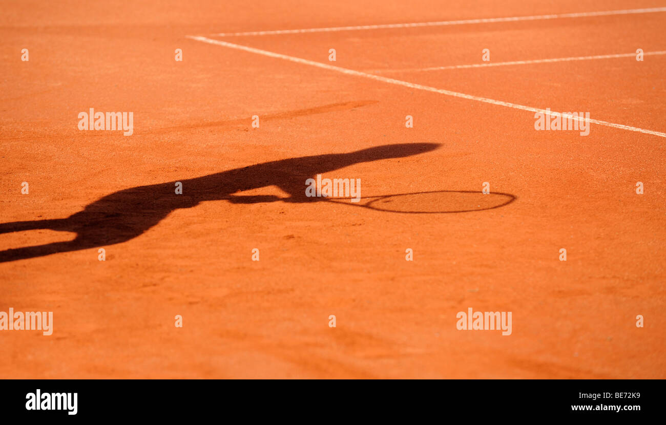 Schatten eines Tennis-Spieler Stockfoto