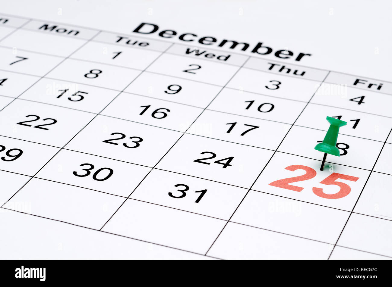 Horizontales Bild eines Kalenders mit Weihnachten markiert mit einer grünen Wende Stockfoto