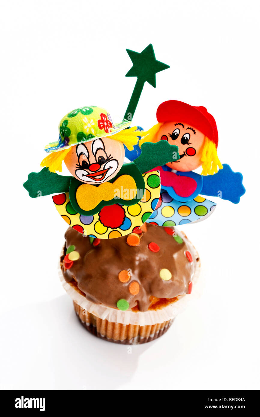 Karneval-Figuren auf einen muffin Stockfoto