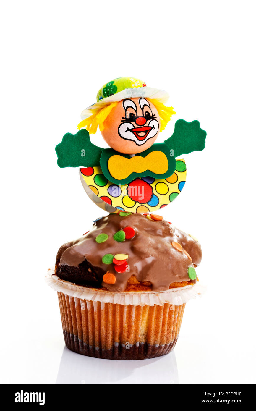 Karneval-Figur auf einen muffin Stockfoto