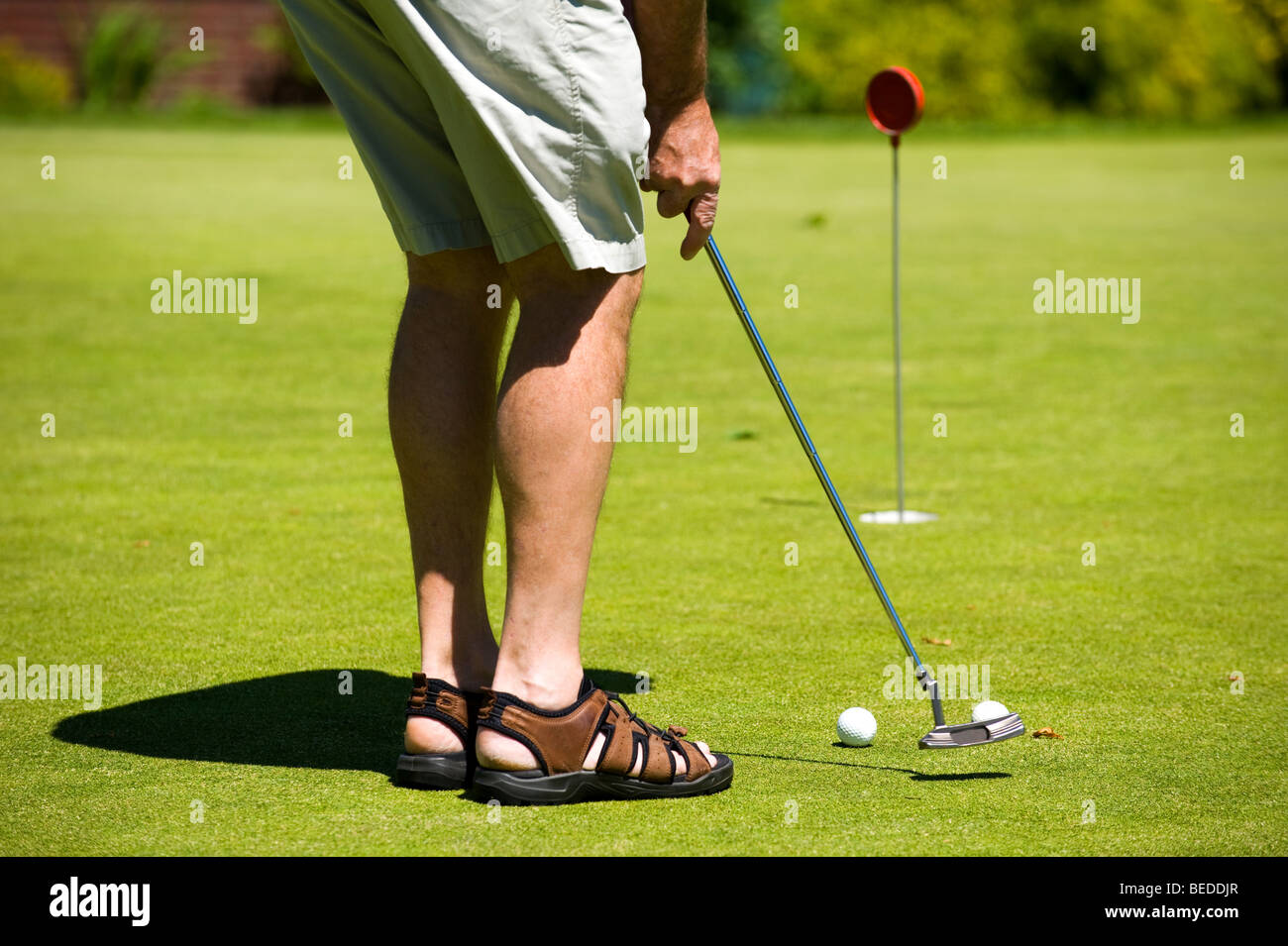 Golfer setzen Stockfoto