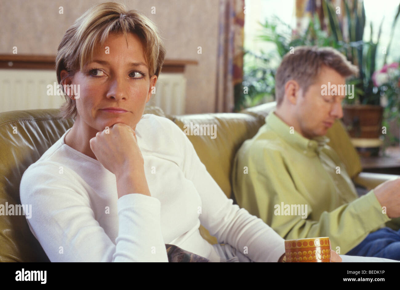 Frau des Partners satt Stockfoto