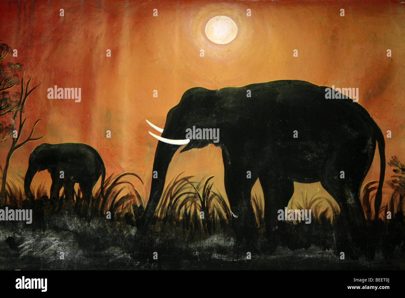 Indische Malerei zeigt Elefanten im Sonnenuntergang Stockfoto