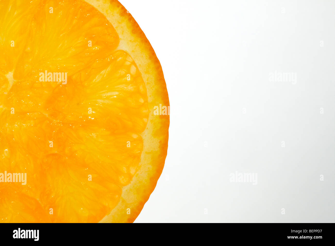 Studioaufnahme von Scheibe orange Hintergrundbeleuchtung mit weißem Hintergrund Stockfoto