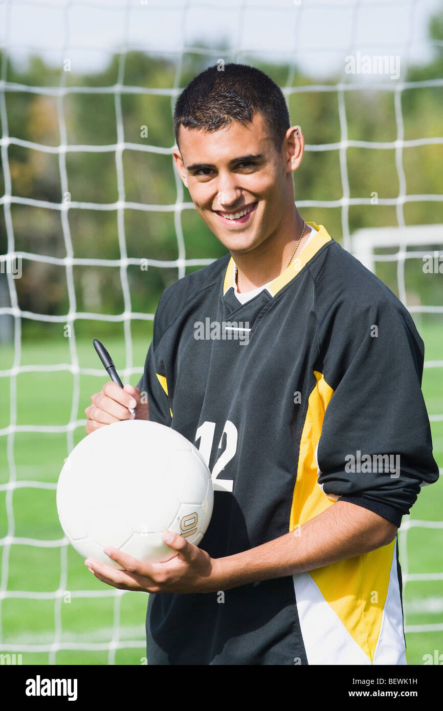 Signierte auf einem Fußball Fußball-Spieler Stockfoto