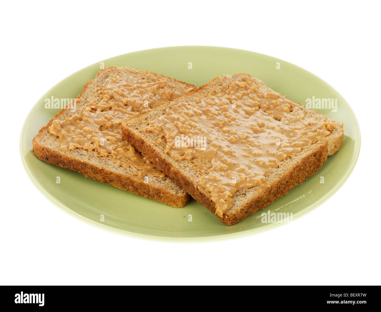 Vollkorn Toast mit Erdnussbutter Stockfoto