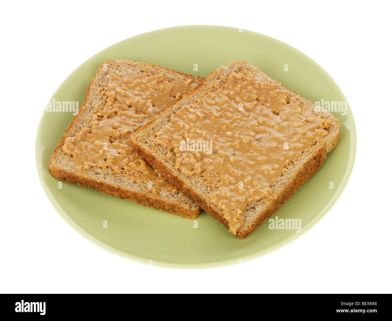 Vollkorn Toast mit Erdnussbutter Stockfoto