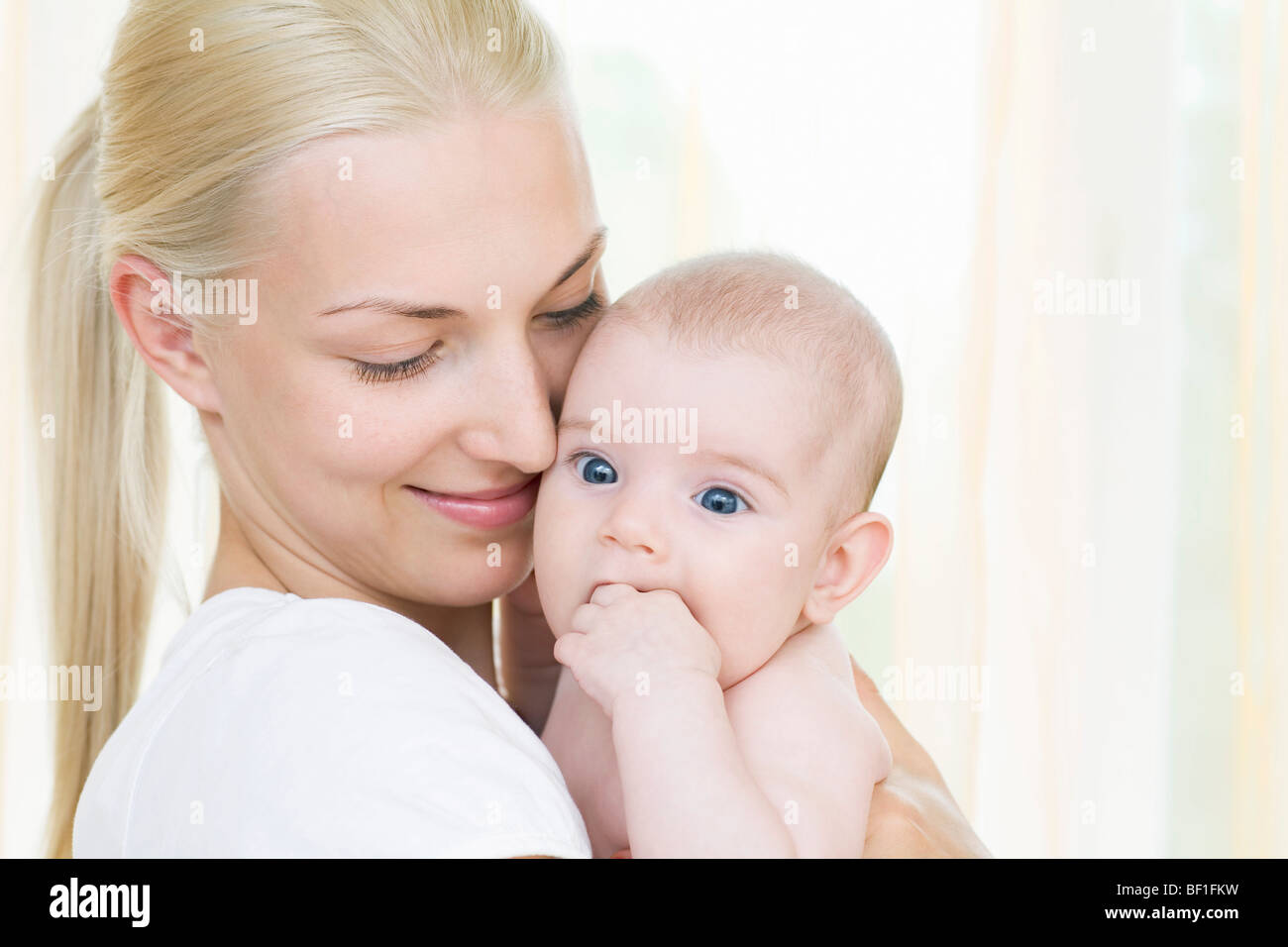 Porträt einer Mutter und Baby Tochter Stockfoto