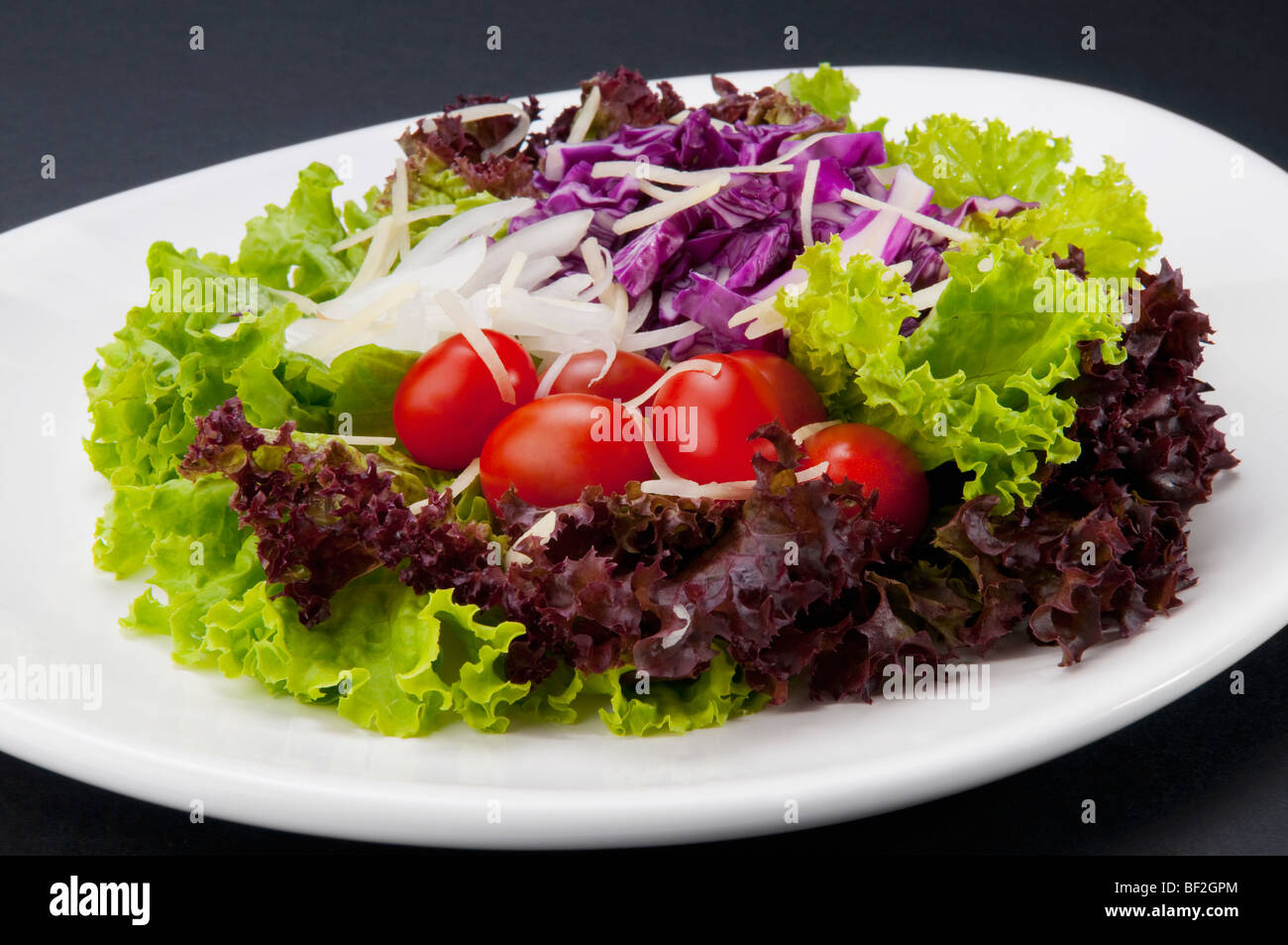 Nahaufnahme von Salat und Tomate Stockfoto