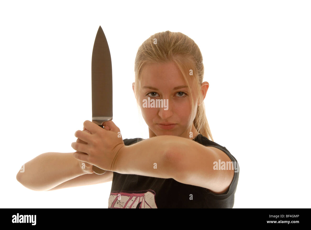 Achtzehn Jahre alte Frau mit einem Messer, Verteidigung Stockfoto