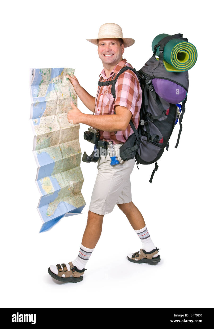 lächelnde Wanderer mit Karte Stockfoto