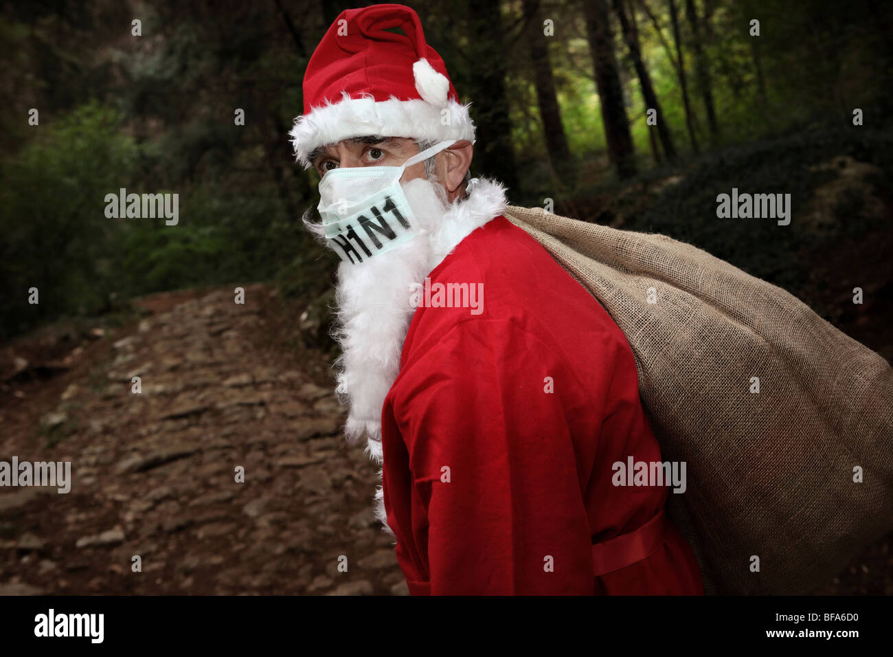 Santa Claus trägt Mundschutz H1N1. Stockfoto