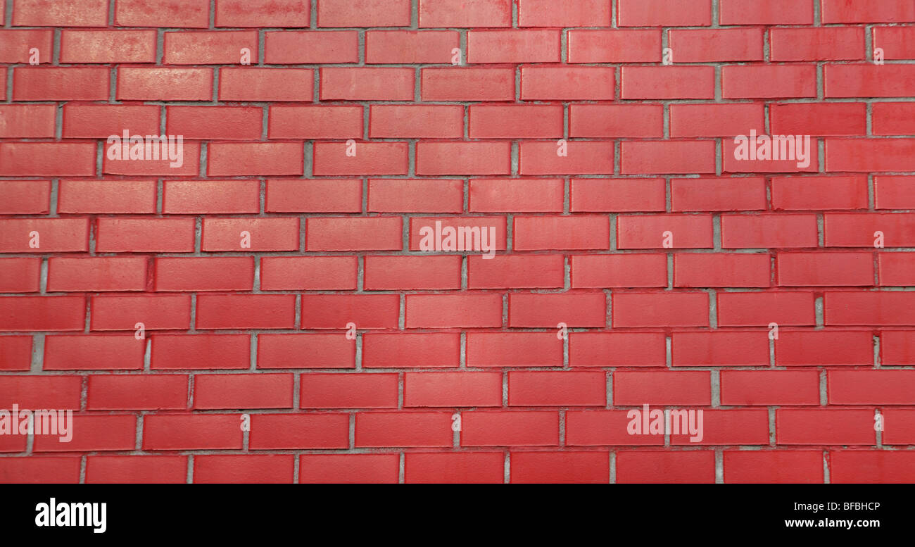 rote Ziegel Wand Hintergrund am Tag Stockfoto