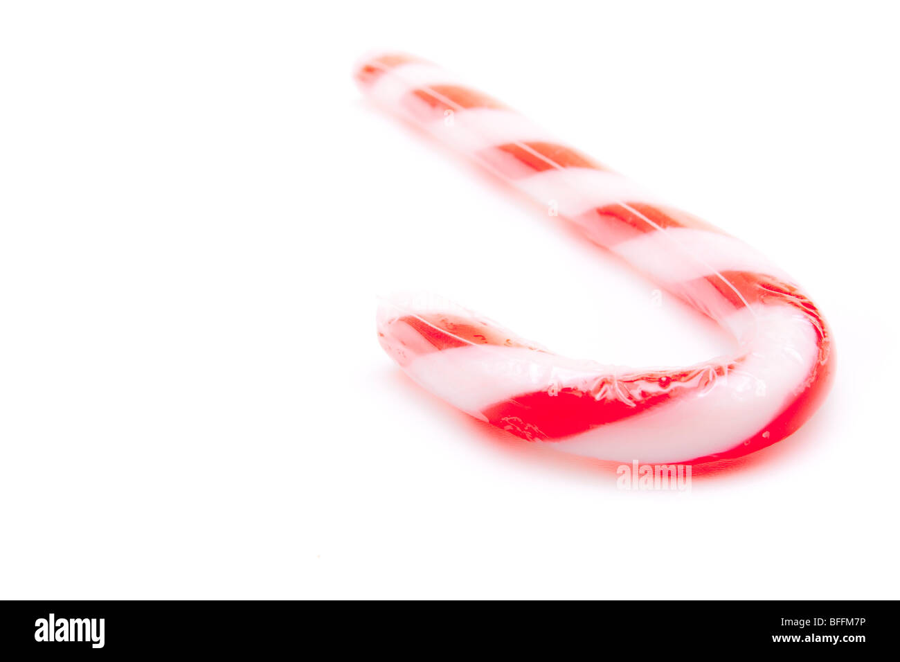 Hohen Schlüsselbild der eine Zuckerstange mit flachen Fokus und Exemplar vor weißem Hintergrund. Stockfoto